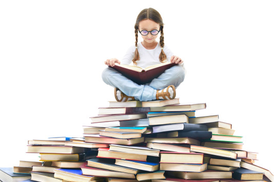 concentrated-girl-surrounded-by-books